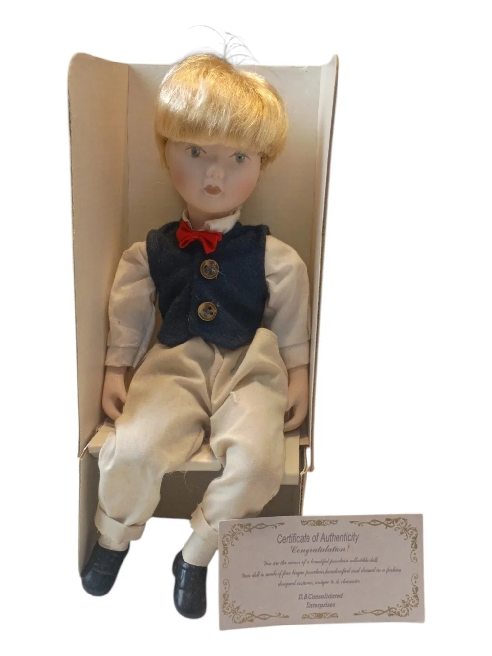 #6017 Blonde Porcelain Doll with Red Bow Tie